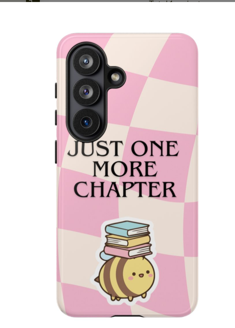 Phone case with 'Just One More Chapter' text and cartoon design on a website interface.